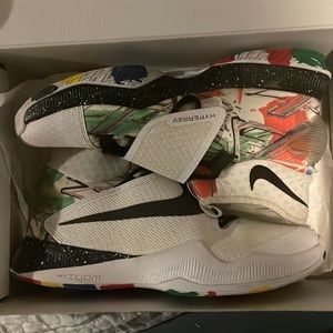 Nike zoom Basketball shoes, sock sleeve and strap over laces.